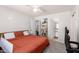 Comfortable bedroom with a ceiling fan and closet access at 12240 W Scotts Dr, El Mirage, AZ 85335