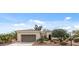 Single-story home with a well-maintained landscaped front yard and a gray two-car garage at 12839 W Rincon Ct, Sun City West, AZ 85375