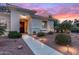 Charming home exterior featuring landscaped yard and inviting entryway with a 'Welcome' sign at 12839 W Rincon Ct, Sun City West, AZ 85375