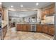 Kitchen featuring granite countertops and an open view into the living room and patio at 12839 W Rincon Ct, Sun City West, AZ 85375