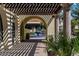 Shaded walkway showcasing the fountain and building architecture at 12839 W Rincon Ct, Sun City West, AZ 85375