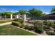 Marley Park community entrance with manicured landscaping and mature trees at 14372 W Aster Dr, Surprise, AZ 85379