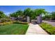 Marley Park community entrance showcasing lush landscaping and a welcoming gate at 14372 W Aster Dr, Surprise, AZ 85379