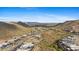 Panoramic aerial view of a desert neighborhood nestled in the mountains under a blue sky at 14455 N Adero Canyon Dr, Fountain Hills, AZ 85268