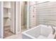 Modern bathroom design featuring a separate shower, tub, and walk-in closet at 14455 N Adero Canyon Dr, Fountain Hills, AZ 85268