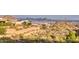 Scenic community view of contemporary homes nestled in a desert setting with mountain backdrop at 14455 N Adero Canyon Dr, Fountain Hills, AZ 85268