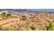Community homes with terraced landscaping blend with desert vegetation and mountain views at 14455 N Adero Canyon Dr, Fountain Hills, AZ 85268