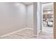 An empty room with sleek, modern wood-look flooring and fresh, neutral-toned walls at 14455 N Adero Canyon Dr, Fountain Hills, AZ 85268