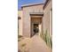 Inviting front entrance with a desert landscape and a modern architectural design at 14455 N Adero Canyon Dr, Fountain Hills, AZ 85268