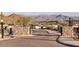 Scenic community entrance with stone pillars, mountain views, and well-maintained streets at 14455 N Adero Canyon Dr, Fountain Hills, AZ 85268