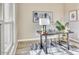 Inviting home office with a modern desk, comfortable chair, and abstract art at 14455 N Adero Canyon Dr, Fountain Hills, AZ 85268