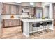 Modern kitchen with stainless steel appliances, a large island, and a stylish breakfast bar at 14455 N Adero Canyon Dr, Fountain Hills, AZ 85268