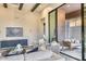 Comfortable living room with a modern design and sliding glass doors that lead to an outdoor space at 14455 N Adero Canyon Dr, Fountain Hills, AZ 85268