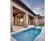 Backyard oasis showcases a modern pool, patio, and outdoor lounge area at 14455 N Adero Canyon Dr, Fountain Hills, AZ 85268