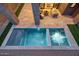 Modern backyard pool and spa area with an outdoor seating space and brick pillars at 14455 N Adero Canyon Dr, Fountain Hills, AZ 85268