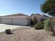 Charming home with a three-car garage and well-maintained desert landscaping at 14462 N Sherwood Dr # B, Fountain Hills, AZ 85268