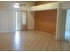 Bright, open-plan living area with sliding glass doors and neutral decor at 14462 N Sherwood Dr # B, Fountain Hills, AZ 85268