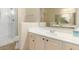 Well-lit bathroom featuring a spacious vanity, toilet, and walk-in shower at 15252 N 100Th St # 1151, Scottsdale, AZ 85260