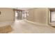 Bright living room with a glimpse of the kitchen and a sliding glass door at 15252 N 100Th St # 1151, Scottsdale, AZ 85260