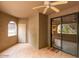 Enclosed tiled patio area with a ceiling fan, offering a versatile outdoor living space at 15252 N 100Th St # 1151, Scottsdale, AZ 85260