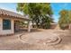 A spacious backyard featuring gravel and potential landscaping opportunities at 16510 W Baden Ave, Goodyear, AZ 85338