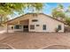 A spacious backyard featuring a covered patio at 16510 W Baden Ave, Goodyear, AZ 85338