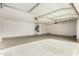 Spacious two-car garage with ample storage space and a water heater at 16510 W Baden Ave, Goodyear, AZ 85338