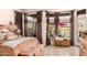 Sun-filled main bedroom featuring large windows with great outdoor views and a relaxing, comfortable atmosphere at 1668 E Saltsage Dr, Phoenix, AZ 85048