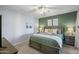 Bedroom with a cozy bed, a calming color scheme, and bedside lamps at 16801 N 94Th St # 2005, Scottsdale, AZ 85260