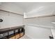 Spacious walk-in closet with ample shelving and built-in storage to keep your wardrobe organized at 16801 N 94Th St # 2005, Scottsdale, AZ 85260
