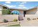 Inviting front entrance with a brick-paved walkway, desert landscaping, and an arched window at 16824 N 38Th Dr, Phoenix, AZ 85053