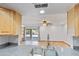 Kitchen featuring granite countertops and stainless sink overlooks the open living space at 16824 N 38Th Dr, Phoenix, AZ 85053
