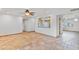 Open living space, kitchen, and backyard access create the perfect entertaining space at 16824 N 38Th Dr, Phoenix, AZ 85053