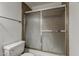 Bathroom featuring a tub and shower combination with a sliding glass door at 1935 W Morten Ave # 17, Phoenix, AZ 85021