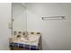 Bathroom featuring vanity with decorative tile, mirror and chrome towel bar at 1935 W Morten Ave # 17, Phoenix, AZ 85021