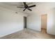 Spacious bedroom with two closets, neutral carpet, and ceiling fan at 1935 W Morten Ave # 17, Phoenix, AZ 85021
