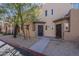 Charming townhome exterior with desert landscaping, secure doors and private entrances at 1935 W Morten Ave # 17, Phoenix, AZ 85021