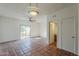 Bright living space with tile floors, ceiling fan, and access to a private patio at 1935 W Morten Ave # 17, Phoenix, AZ 85021