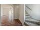Open living space featuring tile floors and an arched doorway at 1935 W Morten Ave # 17, Phoenix, AZ 85021