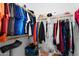 Organized walk-in closet with ample storage space for clothes and accessories at 1950 N Center St # 101, Mesa, AZ 85201