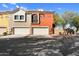 Charming townhome with a well-maintained facade, private garages, and inviting curb appeal at 1950 N Center St # 101, Mesa, AZ 85201