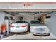 Spacious two-car garage with ample storage shelves and good lighting at 1950 N Center St # 101, Mesa, AZ 85201