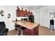 Kitchen with a breakfast bar, offering additional seating and countertop space at 1950 N Center St # 101, Mesa, AZ 85201