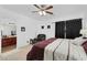 Large main bedroom features an ensuite bathroom and a comfortable seating area at 1950 N Center St # 101, Mesa, AZ 85201