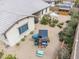 Aerial view of a backyard with a playhouse, landscaping, a shed, and a partial view of the pool at 20961 E Stacey Rd, Queen Creek, AZ 85142