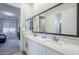 This modern bathroom is well-lit, featuring double sinks and stylish fixtures at 20961 E Stacey Rd, Queen Creek, AZ 85142
