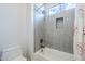 The bathroom features modern tile in shower, a built-in shelf, and a window at 20961 E Stacey Rd, Queen Creek, AZ 85142