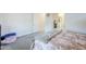 This cozy bedroom boasts plush carpeting and convenient access to an ensuite bathroom at 20961 E Stacey Rd, Queen Creek, AZ 85142