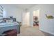 Bedroom with a bed and storage area and a walk-in closet at 20961 E Stacey Rd, Queen Creek, AZ 85142