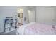Serene bedroom featuring bright colors, a tidy bookcase, and ensuite access at 20961 E Stacey Rd, Queen Creek, AZ 85142
